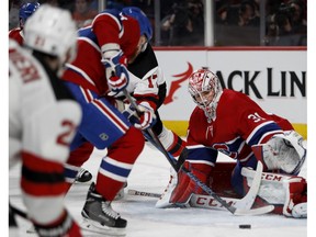 Canadiens goaltender Carey Price makes a save against the New Jersey Devils in Montreal on Sunday, April 1, 2018. Price tied a team record for games played.