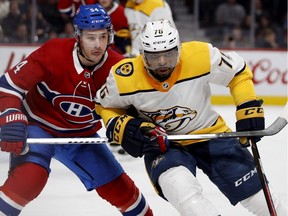 Predators defenseman P.K. Subban holds off Canadiens winger Charles Hudon during Bell Centre action in February. Subban leads a contingent of three former Habs who play for Nashville.