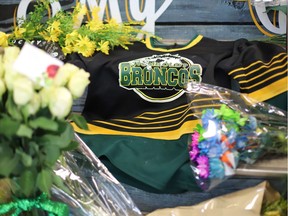 In this file photo taken on April 8, 2018 An ice hockey jersey is left in a makeshift memorial at the Humboldt Uniplex in Humboldt, Canada, on April 8, 2018.