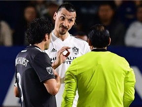 Zlatan Ibrahimovic of LA Galaxy (C) speaks to the referee during the Major League Soccer match between Atlanta United and LA Galaxy in Carson, California on April 21, 2018.
