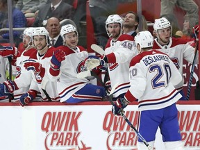 Canadiens winger Nicolas Deslauriers is congratulated by teammates after the first of his two goals Thursday night in Detroit.