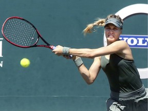 Eugenie Bouchard hits a return to Sara Errani of Italy at the Volvo Car Open tennis tournament in Charleston, S.C., on April 3, 2018.