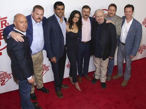 Producer Richard Perello, from left, actors Kevin Heffernan, Jay Chandrasekhar, Emmanuelle Chriqui, Steve Lemme, Brian Cox, Paul Soter and Erik Stolhanske attend the premiere of "Super Troopers 2" at Regal Union Square on Wednesday, April 18, 2018, in New York.