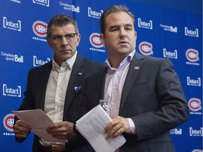 Montreal Canadiens general manager Marc Bergevin, left, and president Geoff Molson leave press conference in Brossard on Monday, April 9, 2018.