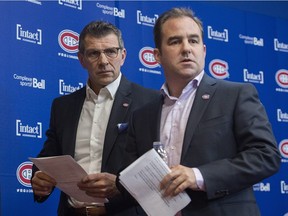 Montreal Canadiens general manager Marc Bergevin, left, and owner Geoff Molson leave an end of season news conference in Brossard on April 9, 2018.