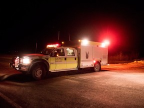 Emergency crews block the highway near the site of a bus crash near Nipawin, Sask., Friday, April 6, 2018. RCMP say people have died and others have been seriously injured in a crash between a transport truck and a bus carrying the Humboldt Broncos junior hockey team northeast of Saskatoon.