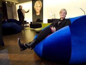 MONTREAL, QUE.: APRIL 2, 2014 -- Designer Marie Saint Pierre sits on a beanbag at an event Wednesday, April 2, 2014 presenting a line of furniture by Saint Pierre at an east-end Montreal furniture store.