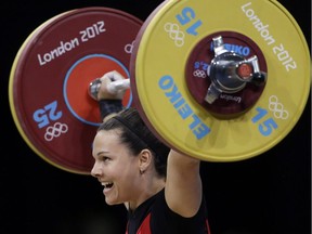 Christine Girard of Canada competes during the women's 63-kg weightlifting competition at the 2012 Summer Olympics.