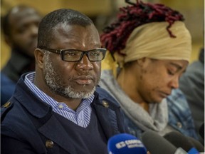 The parents of missing 10-year-old Ariel Kouakou, Frederic Kouakou, left, and Akouena Noella Bibie, right, speak during a press conference in Montreal on Thursday, April 12, 2018.