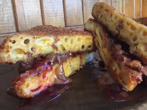 A peanut butter and jelly sandwich with two slabs of fried mac and cheese is but one of the many wild offerings for Mac N' Cheese Week 2018 in Montreal
