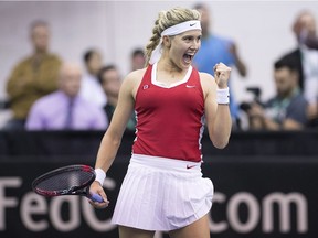 Eugenie Bouchard of Canada reacts after defeating Kateryna Bondarenko of Ukraine in their Fed Cup tennis match in Montreal, Saturday, April 21, 2018.