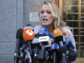 Adult film actress Stormy Daniels speaks outside federal court, Monday, April 16, 2018, in New York.