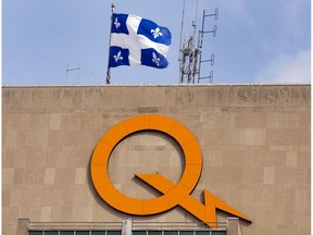 A Hydro Quebec logo is seen on their head office building Thursday, February 26, 2015 in Montreal. The government owned utility announced a net result for 2014 of $3.38 billion.THE CANADIAN PRESS/Ryan Remiorz