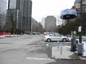 The city intends to build a park on this lot off Bleury St. to replace the Jardin Domtar across the street.