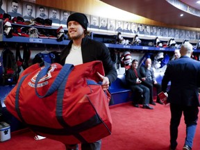 Canadiens forward Jacob de la Rose carries his bag out of the team's locker room in Brossard after the end of NHL season on April 9, 2018.