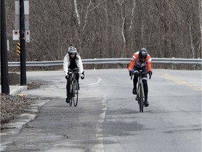 Cyclists are seen on Camillien-Houde Way in this April 2018 file photo.