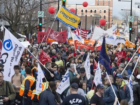 Protestors take part in the annual May Day labour march in Montreal, April 28, 2018.