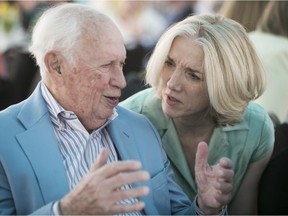 Andrew Harper, who made a donation of $1 million to Chez Doris, speaks with the executive director Marina Boulos-Winton, during a fundraising tea on Sunday May 6, 2018.