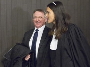 Alain Charron is seen with lawyer Christina Nedelcu at the Palais de Justice in Montreal in May 2017.