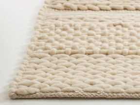 Texture without colour helps add subtle pattern to a room. Knit Rug, 100% undyed wool. $700, EQ3