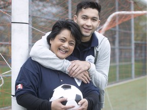 Danielle Dubuc and her son David Choinière, who plays for the Montreal Impact, share a tender moment at parc St-Donat in Montreal on Thursday May 10, 2018.