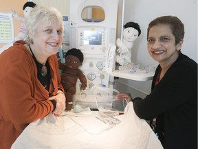 Doctor Sara Meltzer, left, with doctor Alice Benjamin on in the nursery at birthing centre at the new Royal Victoria Hospital on Friday May 11, 2018.