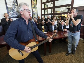 Brian Greenway, left, and Craig Miller from the band Brian Greenway's Blues Bus perform during a press conference for the West Island Blues Fest, which takes place May 24 and June 16.