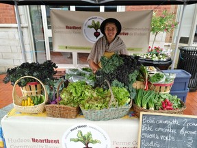 Rébecca Phaneuf-Thibault with some of the produce grown last year by the Hudson Heartbeet Community Farm, which is moving into a new locale.