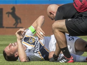 L.A. Galaxy forward Zlatan Ibrahimovic in apparently excruciating pain after slapping Impact defender Michael Petrasso during MLS action at Saputo Stadium in Montreal on Monday, May 21, 2018.