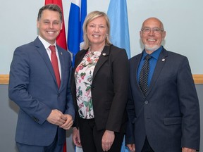Vaudreuil-Soulanges MP Peter Schiefke, Vaudreuil MNA Marie-Claude Nichols and Pincourt Mayor Yvan Cardinal (left to right), after holding a press conference to announce funding for a $1.3 mililon pool project in the town of 15,600 residents.