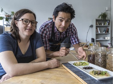 Chefs Maurin Arellano and José-Carlos Redon with a tasting plate featuring three dishes incorporating edible insects. From back to front: escamomles, or ant eggs, also known as Mexican caviar, mixed with the prickly pear fruit of the Nopal cactus, on a lettuce leaf; grasshoppers roasted with maple syrup, then dusted with hibiscus and beetroot salt; chinicuiles, red maguey worms on a corn tortilla spread with avocado.