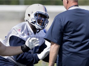 Montreal Alouettes Kirby Fabien, left, runs drills  during a team practice in Montreal on Friday May 25, 2018.