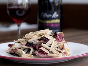 Mon Lapin's rose salad mixes three kinds of radicchio with marinated elderberries and shaved foie gras.