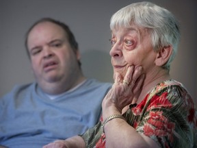 Margo Zeron speaks to the media on Sunday, May 27, 2018. The Zeron family is seeking services in English for her 48-year-old son Mark, left, who has severe autism spectrum disorder.