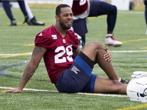 Montreal Alouettes Jermaine Robinson stretches during a team practice in Montreal on Monday May 28, 2018.