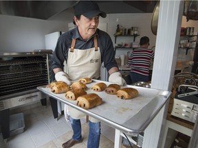 Bertin Savard at his cafe-bakery that has opened in Rigaud with a mission to employ and train people with special needs. (Peter McCabe / MONTREAL GAZETTE)