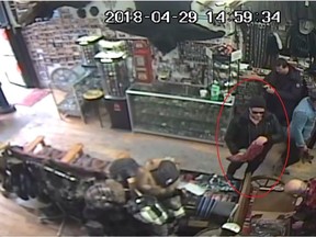 Montreal police are seeking the public's help in identifying a man suspected of repeatedly damaging a St-Laurent Blvd. storefront and threatening the shop's owner.