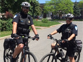 Montreal Police constables Éric Pimparé and Lisa-Marie Bridges from Station 5 in Pointe-Claire patrol near École secondaire Félix-Leclerc. The veteran officers keep an eye out for good and bad behaviour as students roam the parks and residential streets during their midday break.