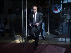 Former Maple Leafs general manager Lou Lamoriello leaves a news conference in Toronto on Sept. 22, 2016.