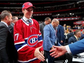 CHICAGO, IL - JUNE 24:  Cale Fleury meets with executives after being selected 87th overall by the Montreal Canadiens during the 2017 NHL Draft at the United Center on June 24, 2017 in Chicago, Illinois.