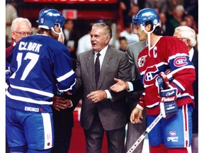 Maurice (Rocket) Richard dropped the puck for the ceremonial faceoff between Canadiens captain Guy Carbonneau and his Maple Leafs counterpart, Wendel Clark, at the Montreal Forum on Oct. 4, 1991. The Leafs were more popular than the Habs in a Canada-wide poll in 1993.