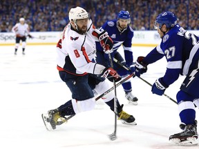 Washington captain Alex Ovechkin takes a shot against Tampa Bay defenceman Ryan McDonagh during the third period of Game 5 of the Eastern Conference final on May 19, 2018.