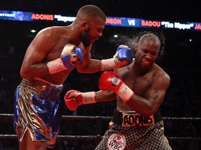 Badou Jac, left, punches Adonis Stevenson of Quebec during their WBC Light Heavyweight title fight at Air Canada Centre on Saturday, May 19, 2018, in Toronto.