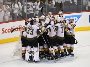 The Vegas Golden Knights celebrate defeating the Winnipeg Jets 2-1 in Game Five of the Western Conference Finals to advance to the 2018 NHL Stanley Cup Final at Bell MTS Place on May 20, 2018 in Winnipeg.