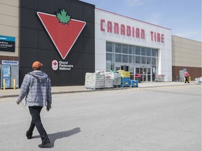 A Canadian Tire shopper make his way through the parking lot of shopping centre on Maurice Duplessis near Gilbert Barbier, in Riviere des Prairies on Tuesday May 1, 2018.