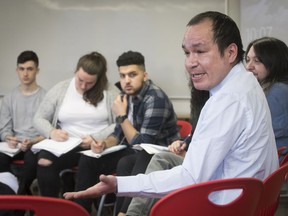 First Nation speaker Terry Weaymouth, right, speaks to students at Vanier on Friday.