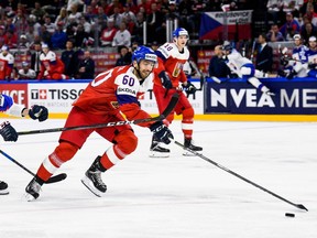 Czech Republic's Michal Moravcik (R) vies with Slovakia's Marek Daloga during the group A match Czech Republic vs Slovakia of the 2018 IIHF Ice Hockey World Championship at the Royal Arena in Copenhagen, Denmark, on May 5, 2018.