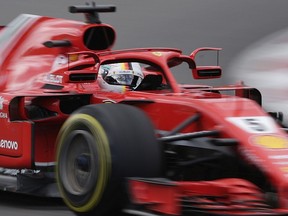 Ferrari driver Sebastian Vettel of Germany steers his car during the Spanish Formula One Grand Prix at the Barcelona Catalunya racetrack in Montmelo, Spain, Sunday, May 13, 2018.
