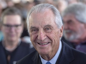 Laurent Beaudoin, right, chairman emeritus of Bombardier Inc., attends the company's annual meeting Thursday, May 3, 2018 in Montreal.