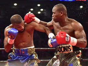 Adonis Stevenson, right, and Badou Jack exchange blows during their WBC light-heavyweight championship boxing match in Toronto on Saturday, May 19, 2018.